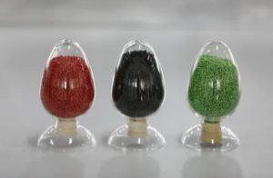 Recycled LDPE polyethylene pellets in hopper feeding cable extrusion line